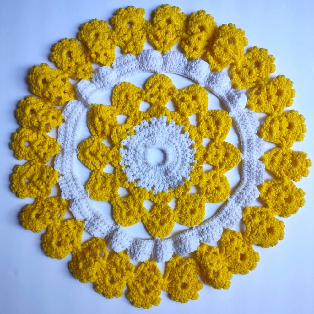 Vintage hand crochet yellow and white yarn doily